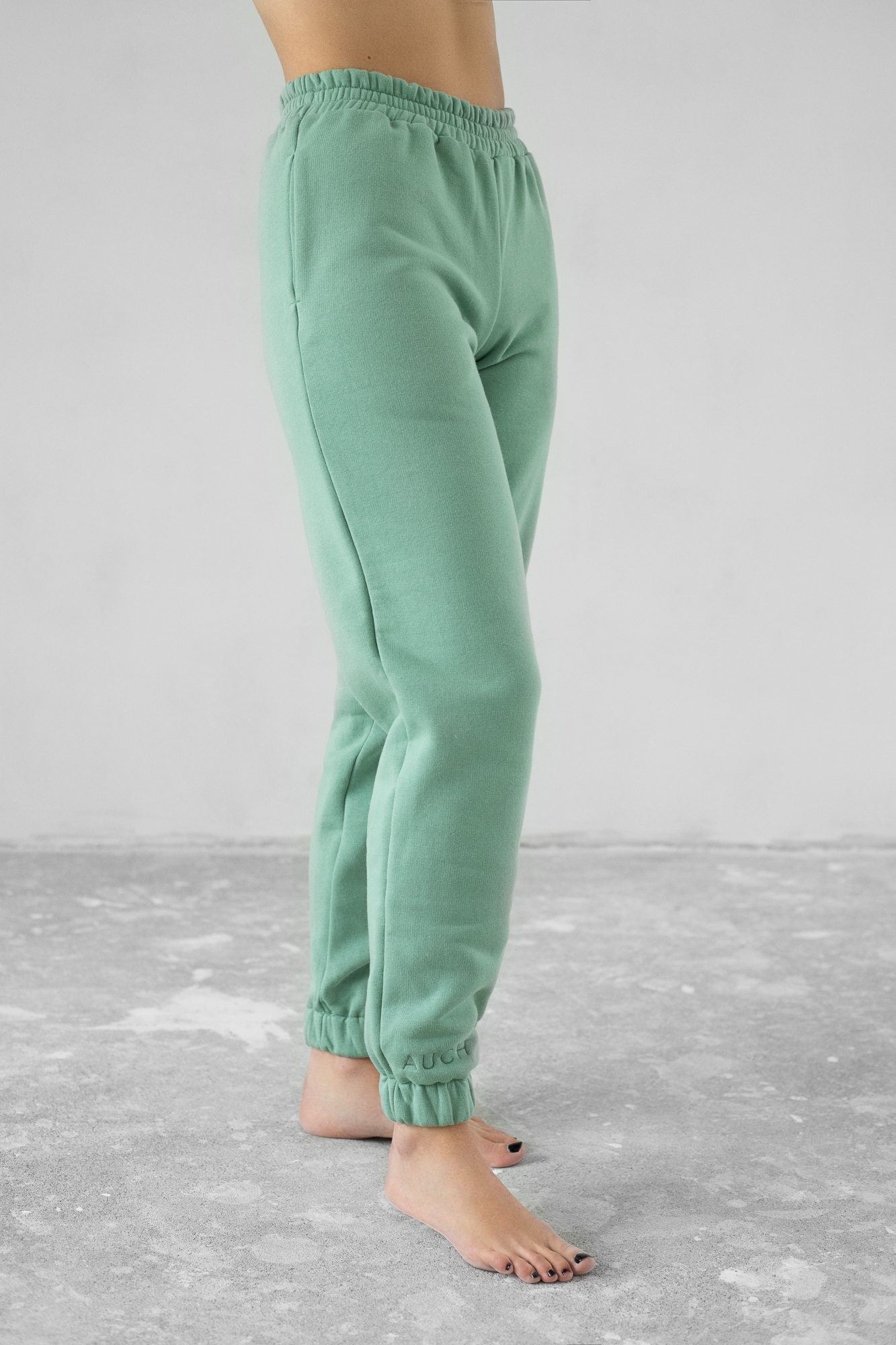 mint green trousers